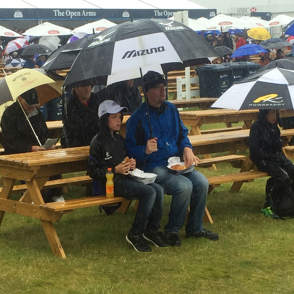 royal-troon-spectators-eating-in-rain.jpg