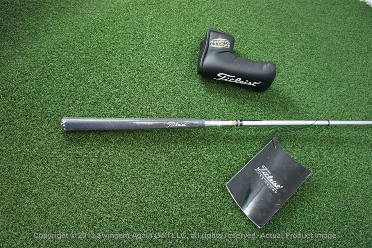 This replica Tiger Woods putter sold to commemorate his ...