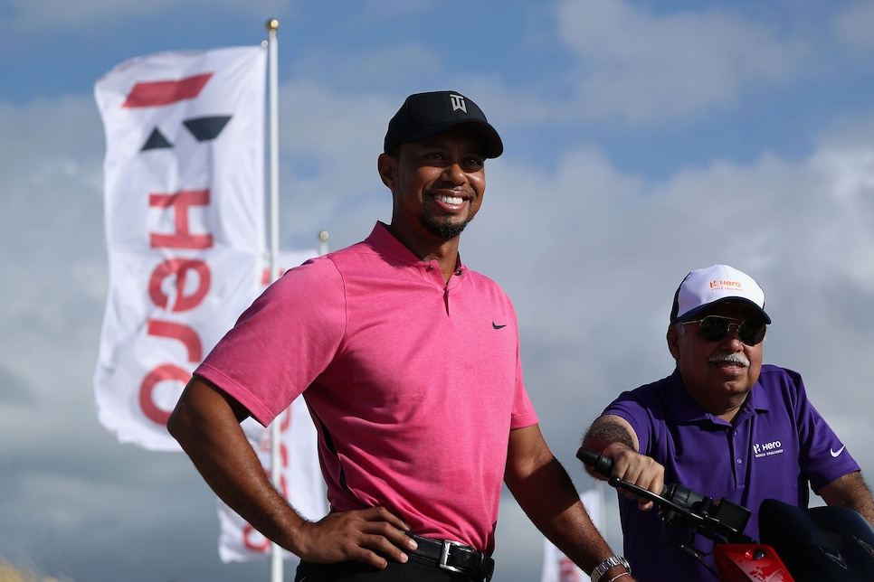 tiger woods pink golf shirt