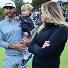 PACIFIC PALISADES, CA - FEBRUARY 19:  Dustin Johnson celebrates his win with wife Paulina Gretzky and son Tatum on the 18th green during the final round at the Genesis Open at Riviera Country Club on February 19, 2017 in Pacific Palisades, California.  (Photo by Harry How/Getty Images)