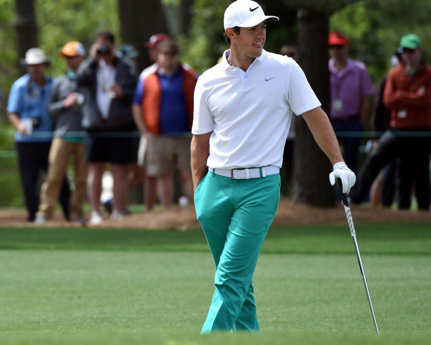 Rory McIlroy's green Nike pants work well because he neutralized the rest of his outfit. And his white belt here works because his polo is white. Otherwise all a white belt does is make someone look shorter.