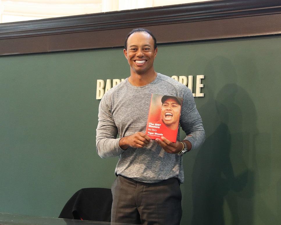 Tiger Woods Signs Copies Of His New Book "The 1997 Masters: My Story"