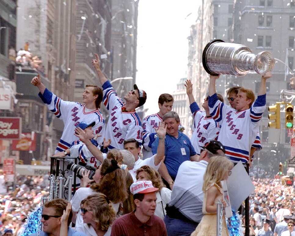 Adam Graves (far left) and Captain Mark Messier (sunglasses)