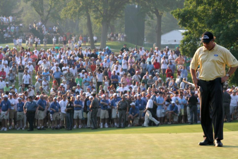 Golfer Phil Mickelson stares at the ground June 18, 2006, on