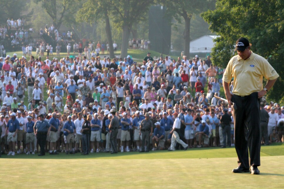 Golfer Phil Mickelson stares at the ground June 18, 2006, on