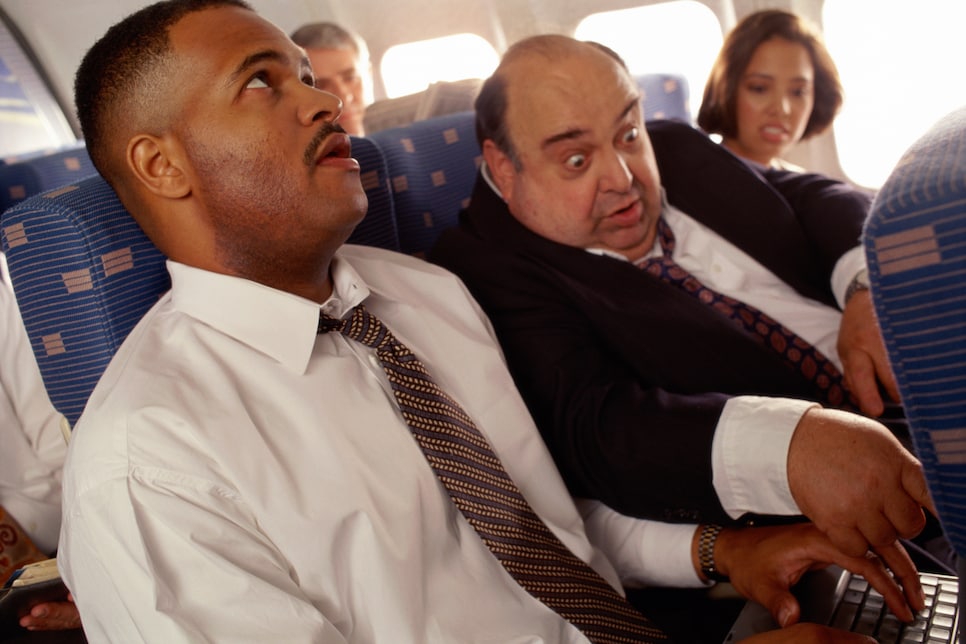 AIRPLANE TRAVEL, MAN ANNOYING PASSENGER