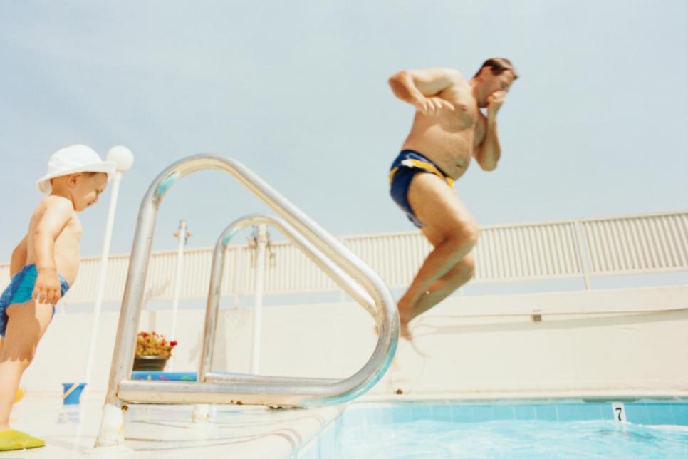 Man Jumping into Pool