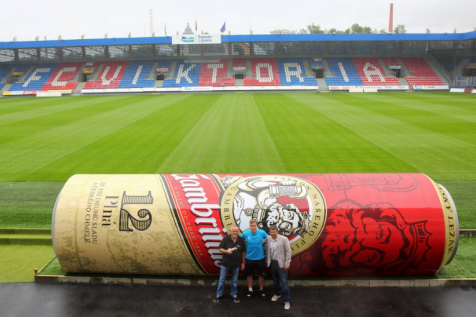 Czech soccer team cracks open giant beer can dugouts