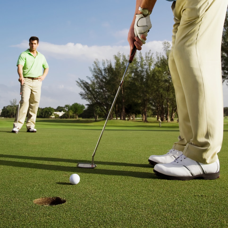 Two golfer playing golf in a golf course,Biltmore Golf Course,Coral Gables,Florida,USA