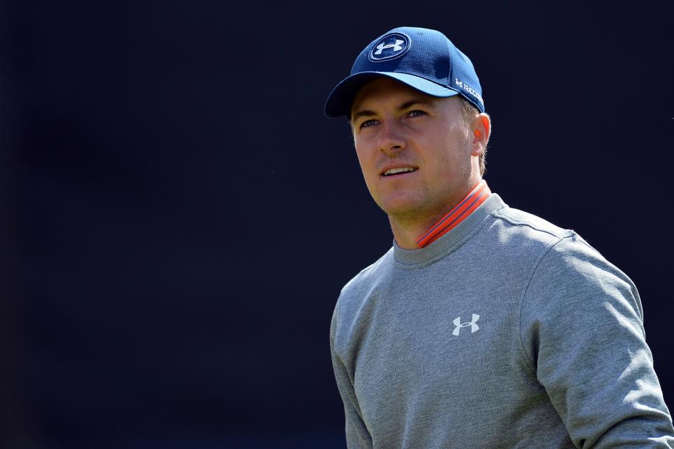 US golfer Jordan Spieth smiles as he leaves the 18th Green during practice on July 13, 2016, ahead of the 2016 British Open Golf Championship at Royal Troon in Scotland.Treacherous and unfamiliar challenges lie in wait as the British Open returns to Royal Troon this week and Rory McIlroy returns to the hunt for the Claret Jug. / AFP / GLYN KIRK / RESTRICTED TO EDITORIAL USE        (Photo credit should read GLYN KIRK/AFP/Getty Images)