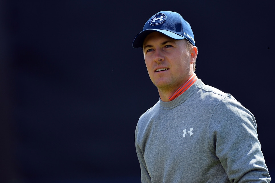 US golfer Jordan Spieth smiles as he leaves the 18th Green during practice on July 13, 2016, ahead of the 2016 British Open Golf Championship at Royal Troon in Scotland.Treacherous and unfamiliar challenges lie in wait as the British Open returns to Royal Troon this week and Rory McIlroy returns to the hunt for the Claret Jug. / AFP / GLYN KIRK / RESTRICTED TO EDITORIAL USE        (Photo credit should read GLYN KIRK/AFP/Getty Images)