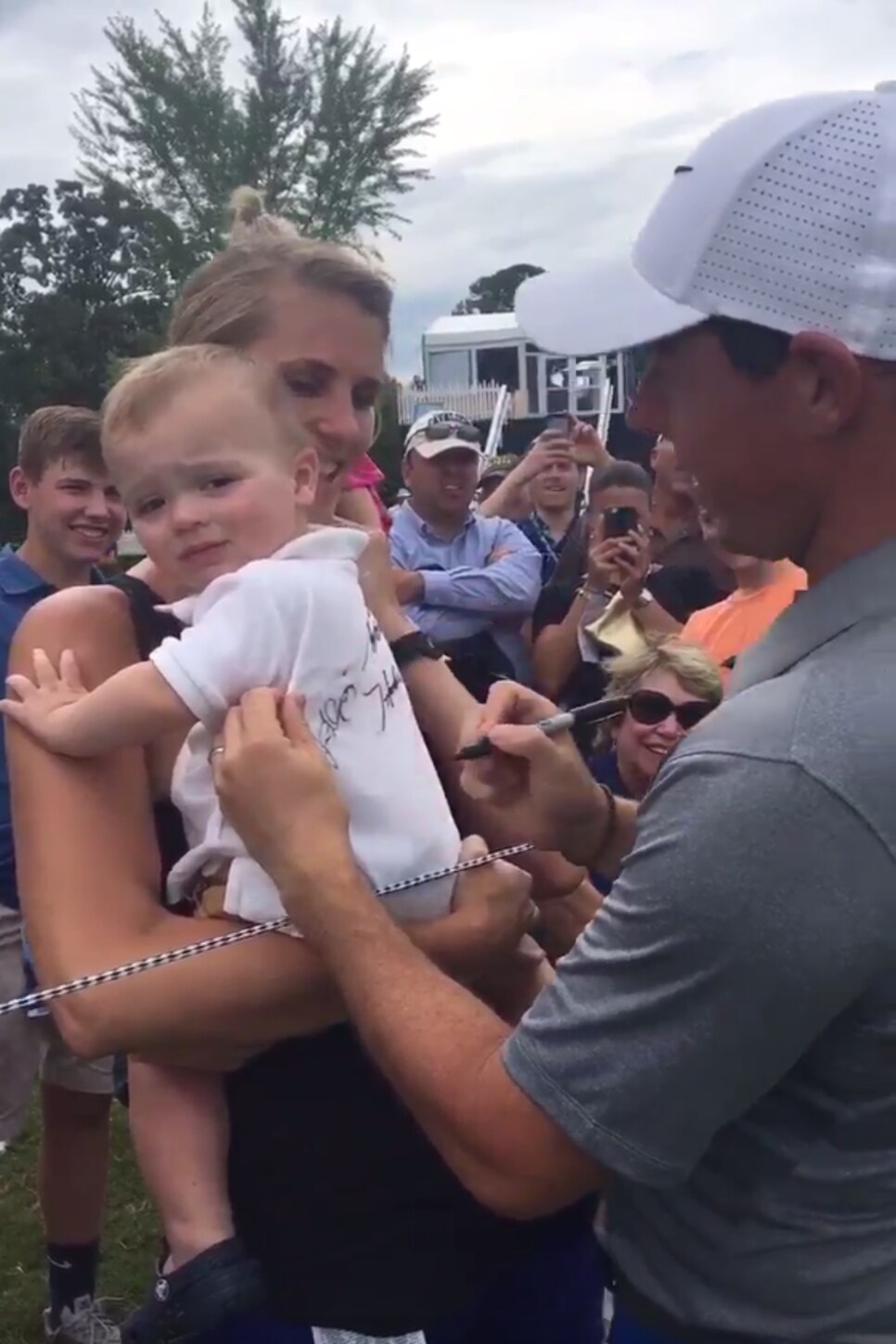 Rory McIlroy signs baby PGA