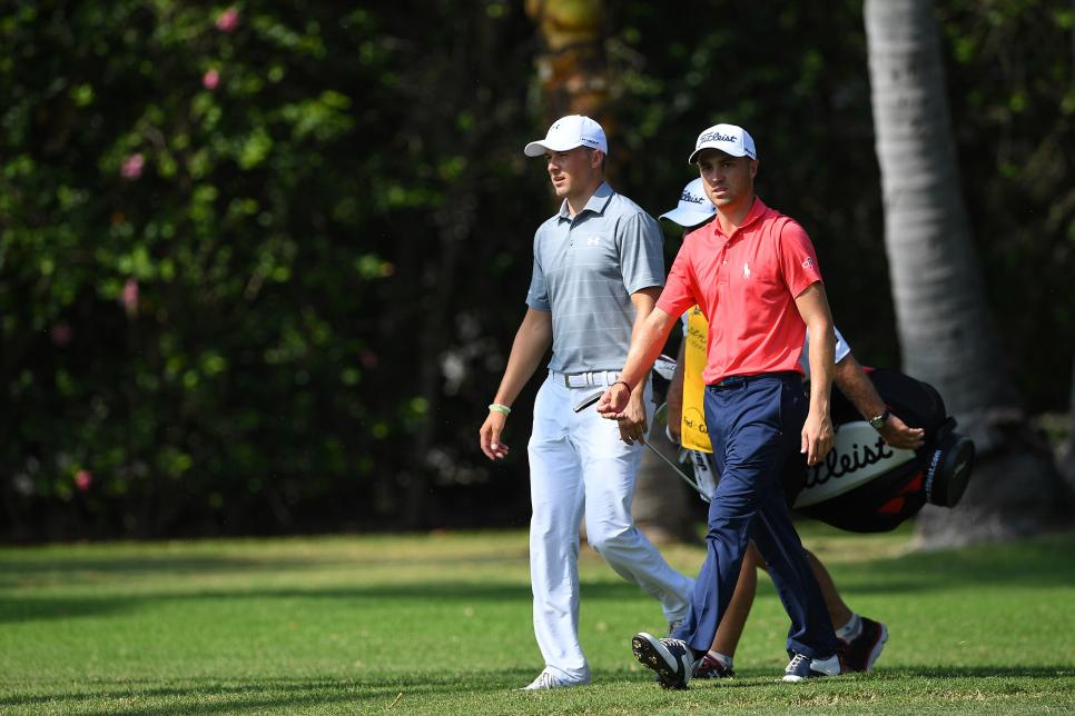HONOLULU, HI - JANUARY 12:  Jordan Spieth (L) and Justin Thomas (R) of the United States walk on the 6th fairway during the first round of the Sony Open In Hawaii at Waialae Country Club on January 12, 2017 in Honolulu, Hawaii.  (Photo by Masterpress/Getty Images)
