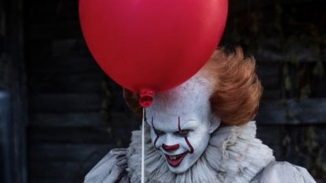 Thanks to ‘IT’, some creep is tying up red balloons all over this small town