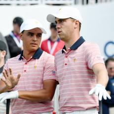 JERSEY CITY, NJ - SEPTEMBER 29: Rickie Fowler of the U.S. Team and Justin Thomas of the U.S. Team on the first tee during the Friday four-ball matches during the second round of the Presidents Cup at Liberty National Golf Club on September 29, 2017, in Jersey City, New Jersey. (Photo by Chris Condon/PGA TOUR)