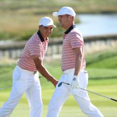 JERSEY CITY, NJ - SEPTEMBER 29: Justin Thomas of the U.S. Team reacts to holing out on the 14th hole with teammate Rickie Fowler of the U.S. Team during the Friday four-ball matches during the second round of the Presidents Cup at Liberty National Golf Club on September 29, 2017, in Jersey City, New Jersey. (Photo by Chris Condon/PGA TOUR)