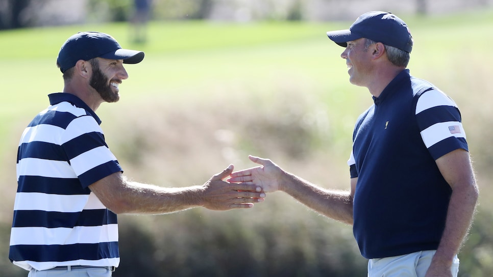 dustin-johnson-matt-kuchar-presidents-cup-2017-thursday-hand-slap.jpg