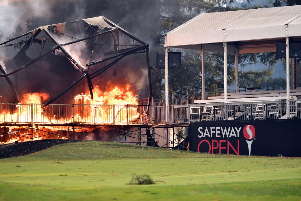 A tent structure built for the 2017 Safeway Open burns on a golf course at the Silverado Resort and Spa in Napa, California on October 9, 2017, as multiple wind-driven fires continue to whip through the region.  / AFP PHOTO / JOSH EDELSON        (Photo credit should read JOSH EDELSON/AFP/Getty Images)