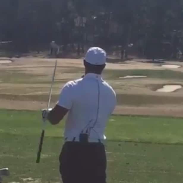 Tiger Woods hits more shots at golf clinic, shows off vintage club