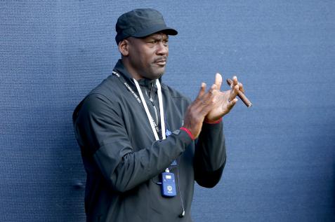 Michael Jordan talks golf -- and smoking SIX cigars per day -- in Cigar Aficionado interview