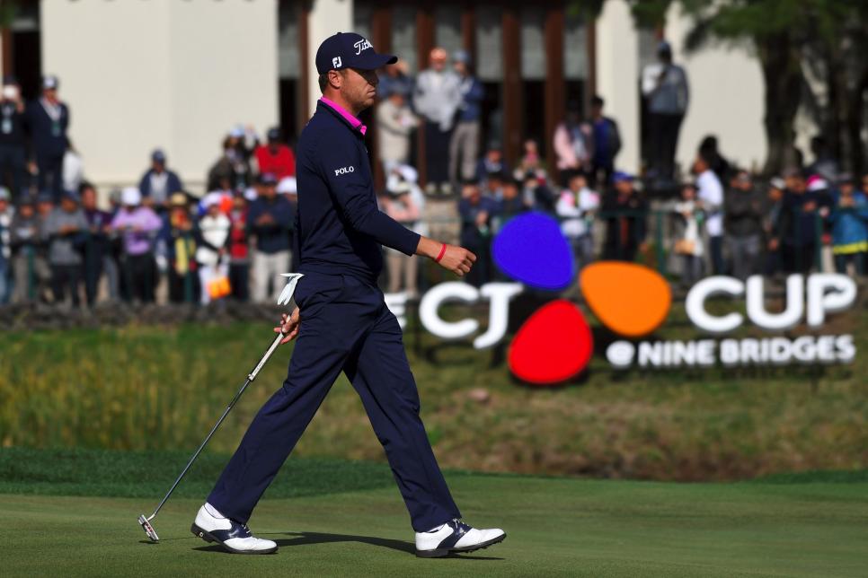 Justin Thomas of the US walks on the 18th green during the final round of the CJ Cup at Nine Bridges in Jeju Island on October 22, 2017. / AFP PHOTO / JUNG Yeon-Je        (Photo credit should read JUNG YEON-JE/AFP/Getty Images)