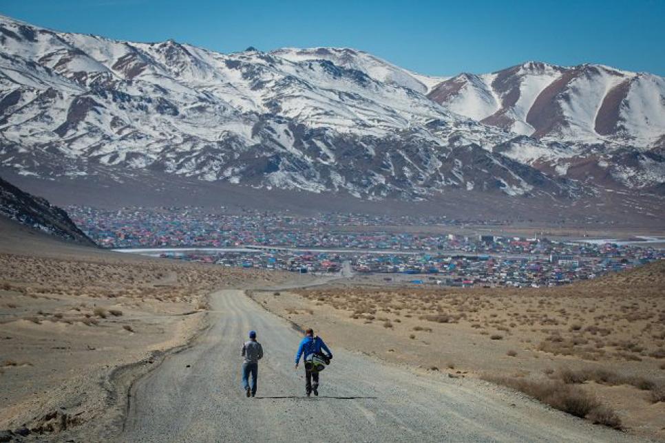 mongolia-walking-towards-mountains-backdrop.jpg