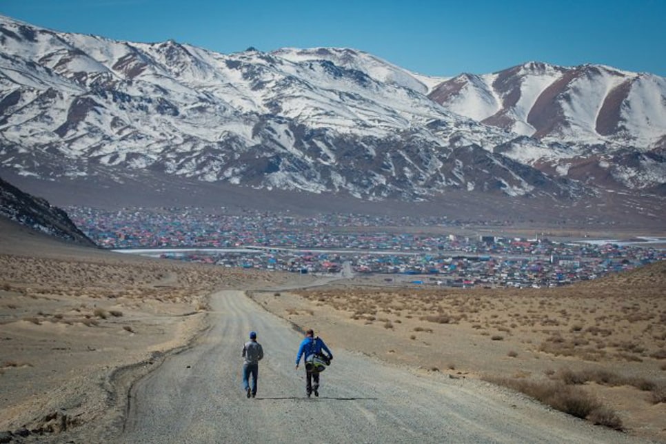 mongolia-walking-towards-mountains-backdrop.jpg