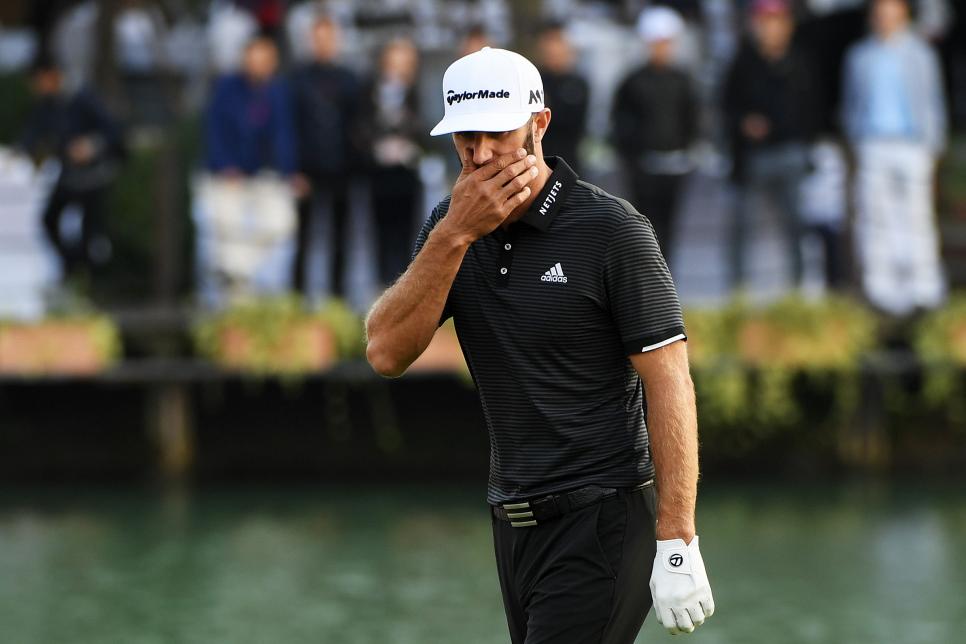 SHANGHAI, CHINA - OCTOBER 29:  Dustin Johnson of the United States reacts on the 18th green during the final round of the WGC - HSBC Champions at Sheshan International Golf Club on October 29, 2017 in Shanghai, China.  (Photo by Ross Kinnaird/Getty Images)