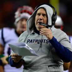 DENVER, CO - NOVEMBER 12:  Head coach Bill Belichick of the New England Patriots reviews a printout on the sideline during a game at Sports Authority Field at Mile High on November 12, 2017 in Denver, Colorado. (Photo by Dustin Bradford/Getty Images)