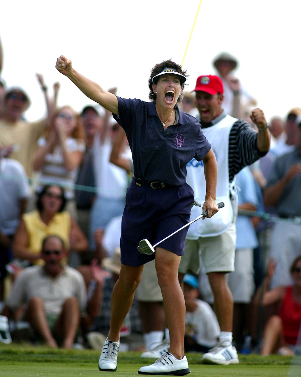 Julie Inkster celebrates her birdie putt on number