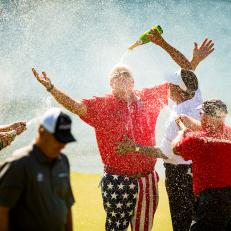 THE WOODLANDS, TX - MAY 07: John Daly of the United States is sprayed with champagne at the eighteenth green following his victory at the PGA TOUR Champions Insperity Invitational at The Woodlands Country Club on May 7, 2017 in The Woodlands, Texas. (Photo by Darren Carroll/Getty Images)
