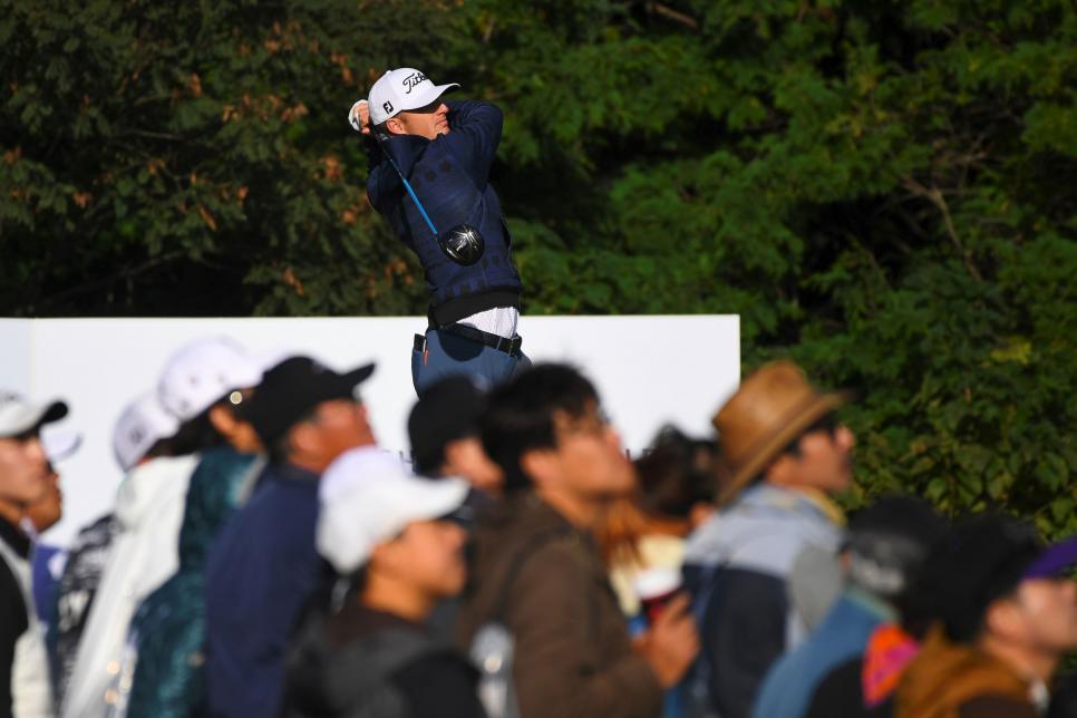 Morgan Hoffmann of the US tees off on the 3rd hole during the final round of the CJ Cup at Nine Bridges in Jeju Island on October 22, 2017. / AFP PHOTO / JUNG Yeon-Je        (Photo credit should read JUNG YEON-JE/AFP/Getty Images)
