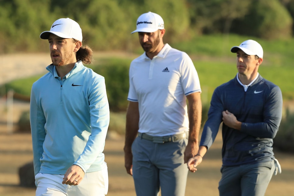 tommy-fleetwood-dustin-johnson-rory-mcilroy-abu-dhabi-2018-thursday-walking.jpg