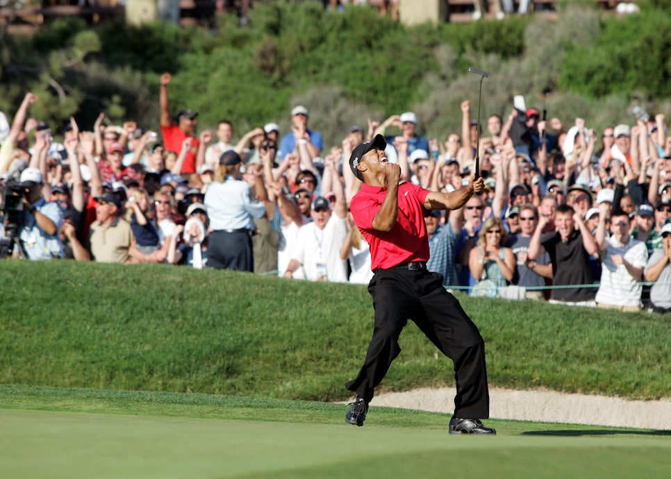 15 June 2008: Tiger Woods birdies the 18th hole and celebrates to send it to a playoff round against Rocco Mediate (not pictured) during the final round of the US Open Championship at Torrey Pines South Golf Course in San Diego, CA. (Photo by Charles Baus/Icon Sportswire via Getty Images)