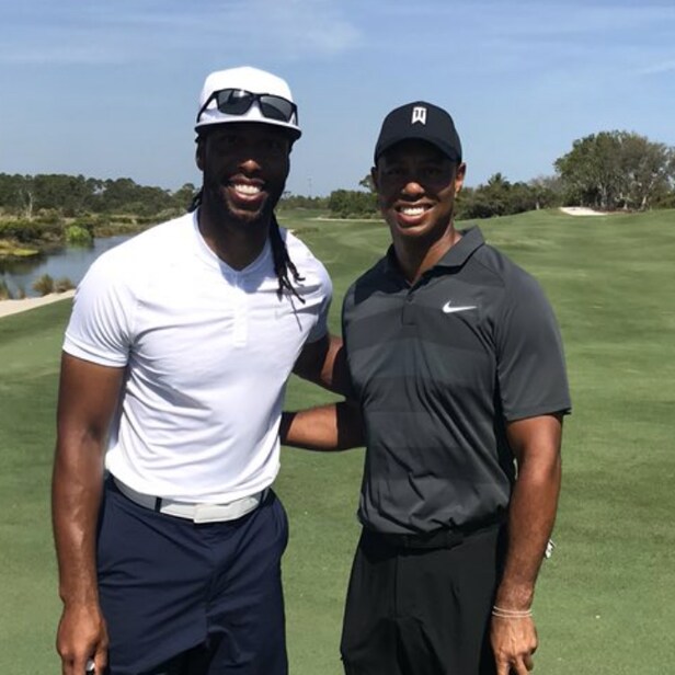 Larry Fitzgerald plays with Tiger Woods, continues incredible off