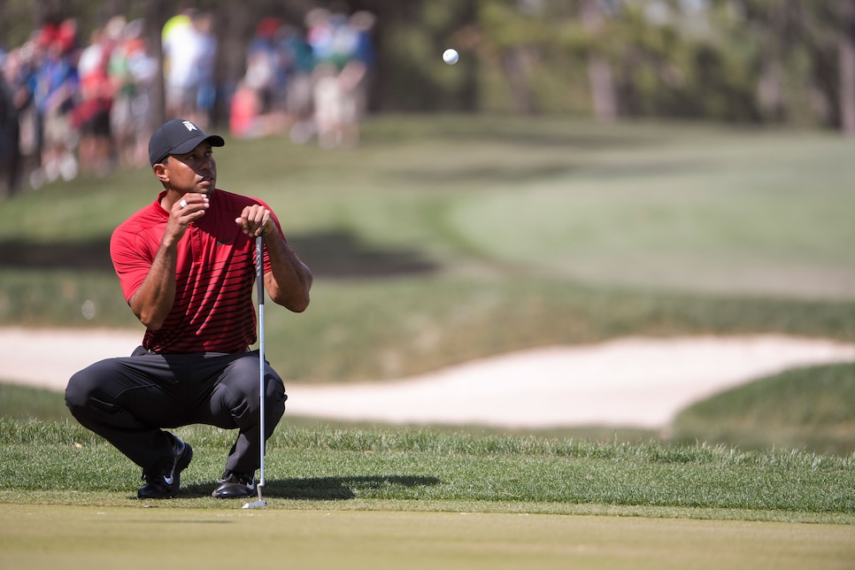 tiger-woods-valspar-2018-sunday-catching-ball-toss.jpg