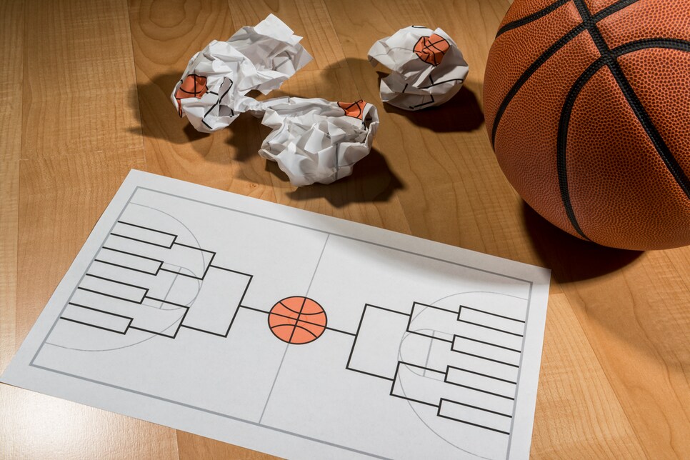 Trying to fill out college basketball tournament bracket on paper