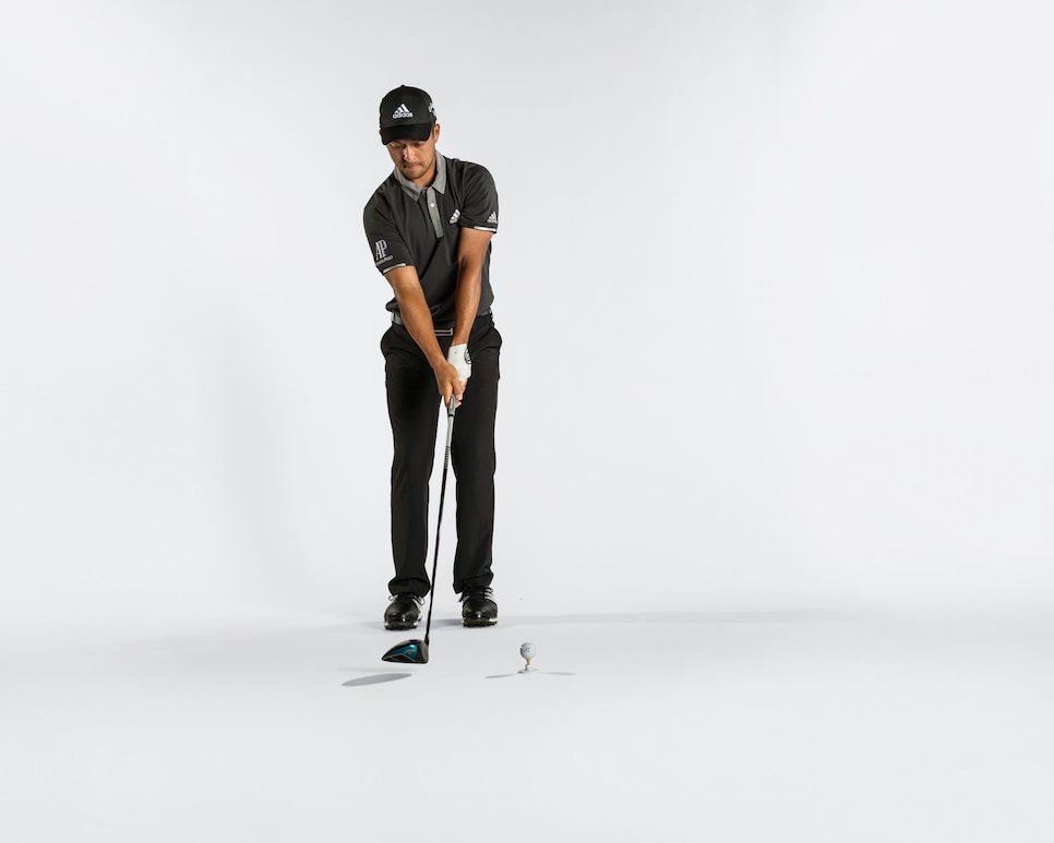 xander-schauffele-instruction-may-2018-stepping-to-address.jpg