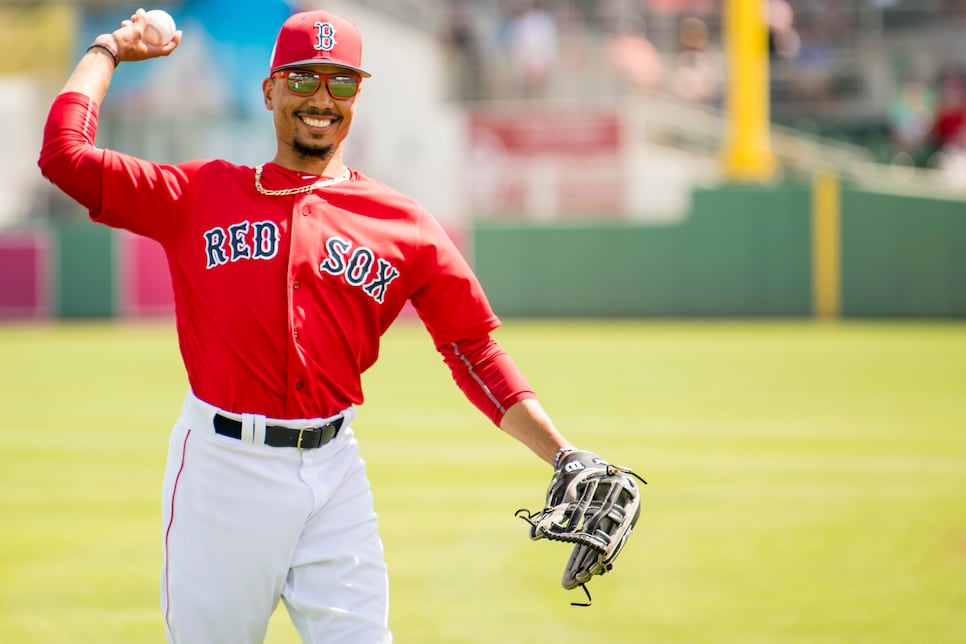 Red Sox outfielder Mookie Betts takes batting practice dur…