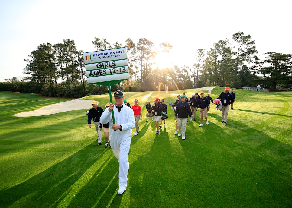 Drive, Chip and Putt Girls 12-13 participants warm-up on the Tournament Practice Facility during the Drive, Chip and Putt National Finals at Augusta National Golf Club, Sunday, April 1, 2018.