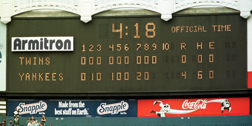 The scoreboard in center fields reads all zeros fo