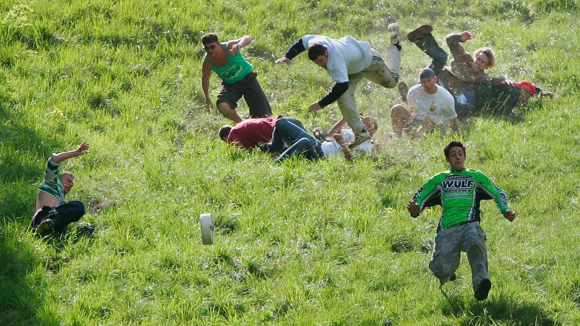 The scenes from this year's Cooper's Hill Cheese Rolling are pure chaos