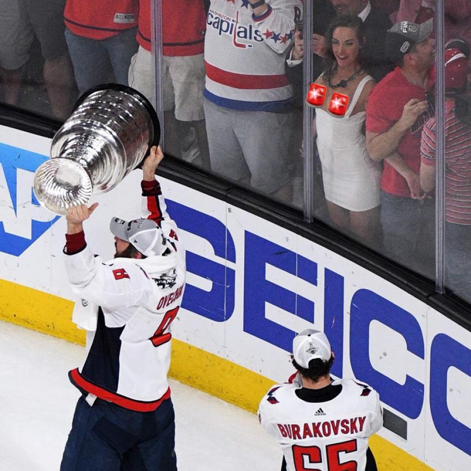 Hockey Chick flashes entire Washington Capitals team mid-Stanley Cup lap.
