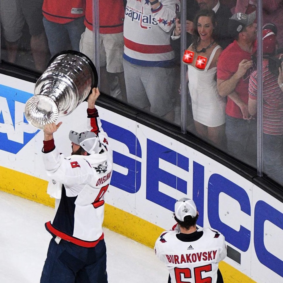 Hockey Chick flashes entire Washington Capitals team mid-Stanley Cup lap.