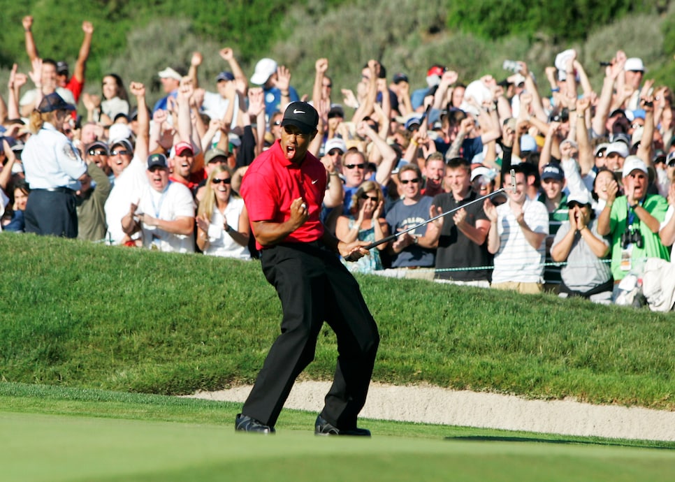 15 June 2008: Tiger Woods birdies the 18th hole and celebrates to send it to a playoff round against Rocco Mediate (not pictured) during the final round of the US Open Championship at Torrey Pines South Golf Course in San Diego, CA. (Photo by Charles Baus/Icon Sportswire via Getty Images)