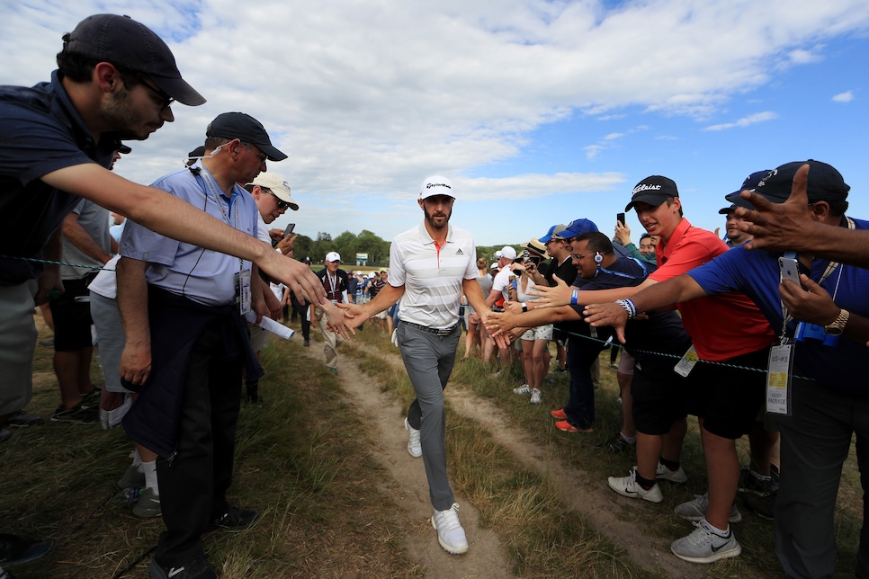 dustin-johnson-2018-us-open-thursday-walking-in-crowd.jpg