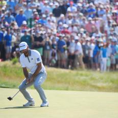 SOUTHAMPTON, NY - JUNE 17:  Dustin Johnson of the United States reacts to a missed putt on the ninth green during the final round of the 2018 U.S. Open at Shinnecock Hills Golf Club on June 17, 2018 in Southampton, New York.  (Photo by Ross Kinnaird/Getty Images)