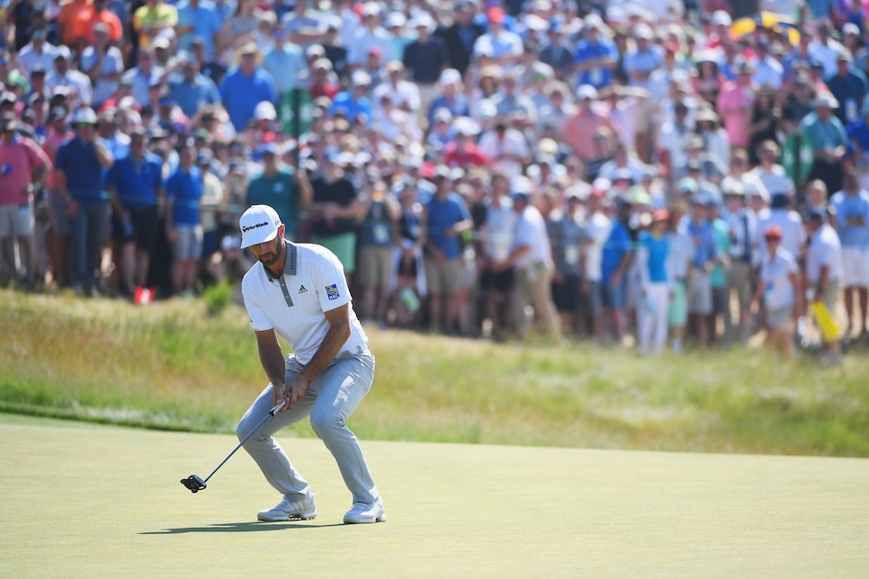 SOUTHAMPTON, NY - JUNE 17:  Dustin Johnson of the United States reacts to a missed putt on the ninth green during the final round of the 2018 U.S. Open at Shinnecock Hills Golf Club on June 17, 2018 in Southampton, New York.  (Photo by Ross Kinnaird/Getty Images)