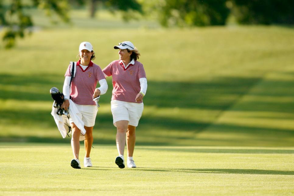 26 MAY 2006:  USC Head Coach Andrea Gaston congratulates Dewi Schreefel as they approach the 18th green during the Division I Women\'s Golf Championship held at the Scarlet Course on the Ohio State University campus in Columbus, OH.  Schreefel won the individual title with a -2 overall score.  Jamie Schwaberow/NCAA Photos