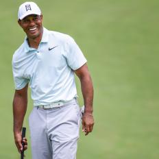 POTOMAC, MD - JUNE 26:  Tiger Woods smiles while testing a TaylorMade Ardmore 3 mallet putter on the 15th hole during practice for the Quicken Loans National at TPC Potomac at Avenel Farm on June 26, 2018 in Potomac, Maryland. (Photo by Keyur Khamar/PGA TOUR)